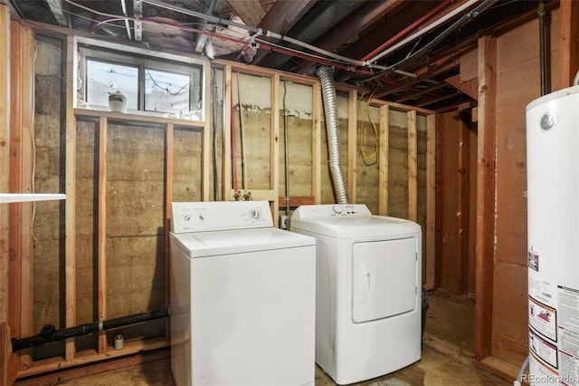 6155 Carr St, Arvada, CO 80004 - washroom featuring gas water heater and separate washer and dryer