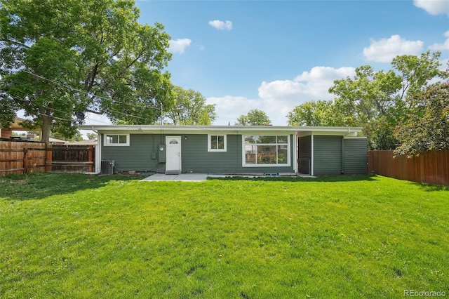 6155 Carr St, Arvada, CO 80004 - rear view of property with central air condition unit