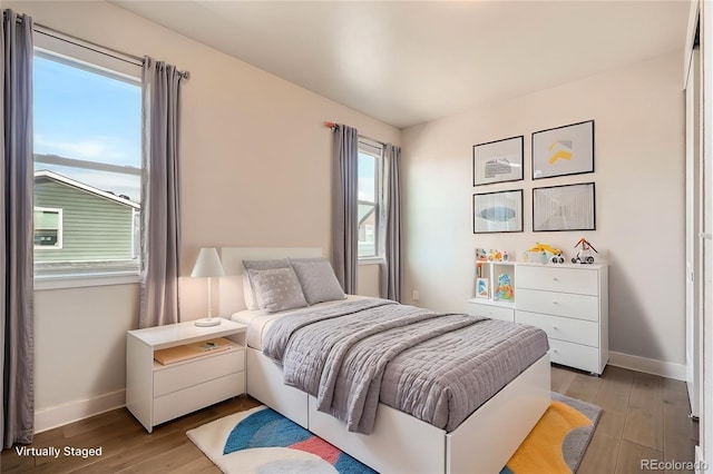 bedroom featuring hardwood / wood-style floors