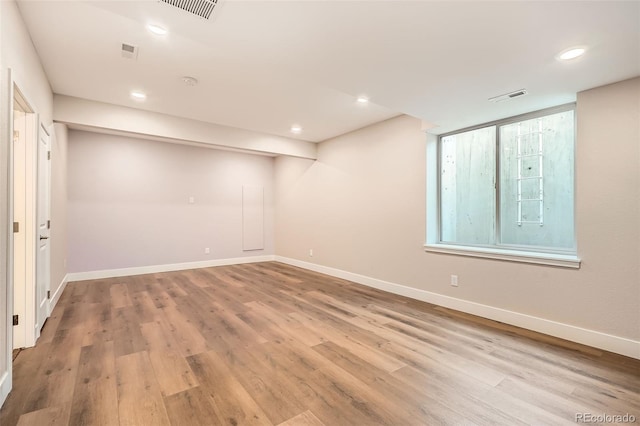 empty room with light wood-type flooring