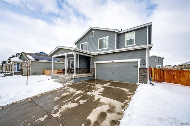 view of front of property with a garage