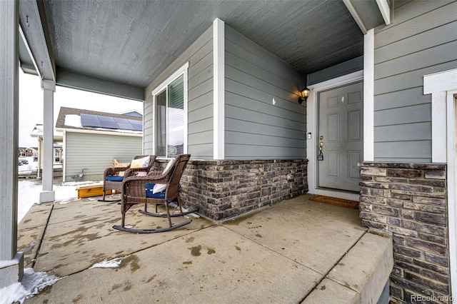 property entrance with a porch