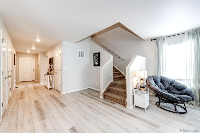 sitting room with light wood-type flooring