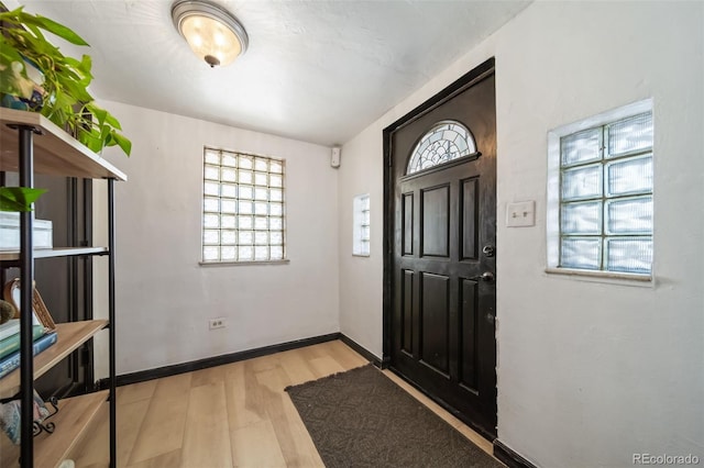 foyer with light hardwood / wood-style flooring