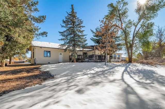 view of front of house featuring a deck