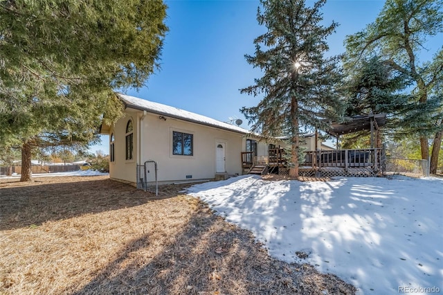 rear view of house with a deck