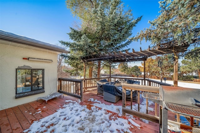 view of snow covered deck