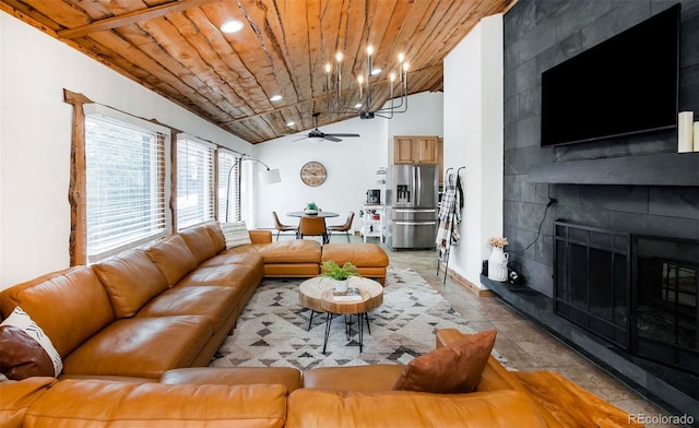 tiled living room with a tiled fireplace, lofted ceiling, wooden ceiling, and ceiling fan