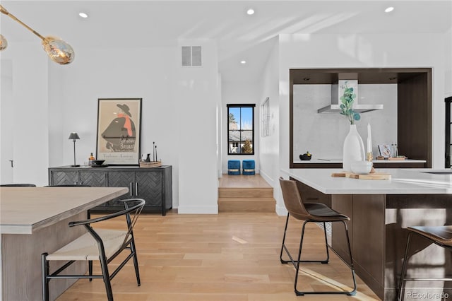 dining room with light wood-type flooring