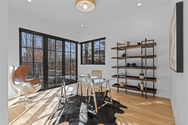 office area with light hardwood / wood-style flooring