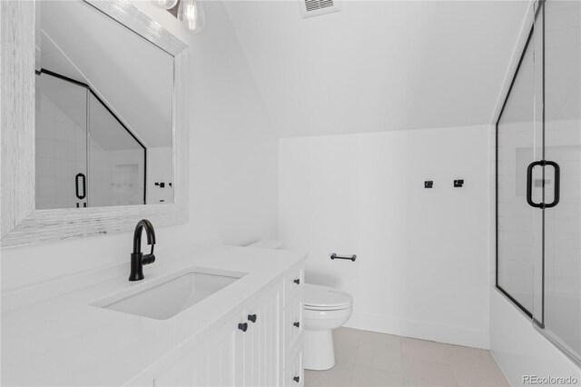 full bathroom featuring enclosed tub / shower combo, vanity, toilet, and vaulted ceiling