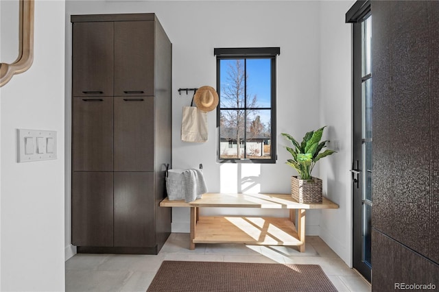 interior space with light tile patterned floors