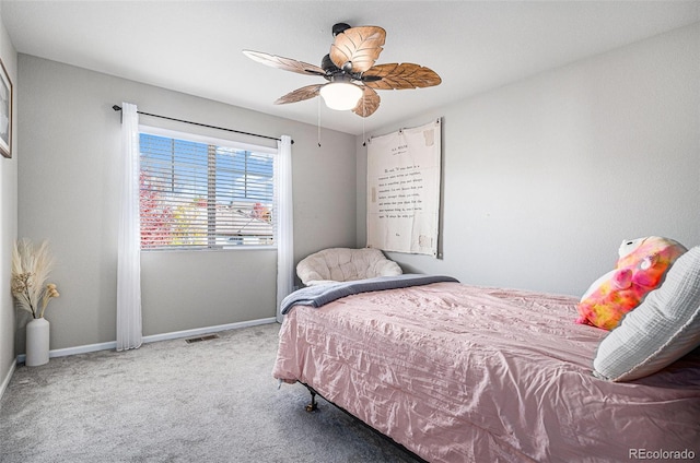 bedroom featuring ceiling fan and carpet floors