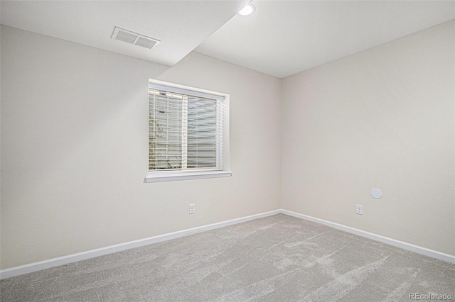 view of carpeted spare room