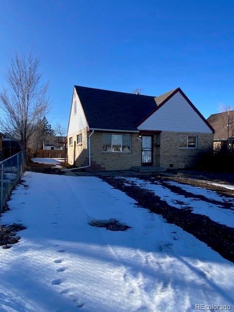 view of snow covered property