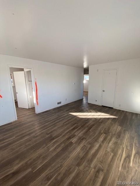 interior space featuring dark wood-type flooring