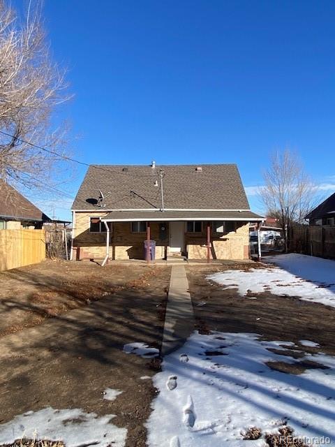 view of snow covered property