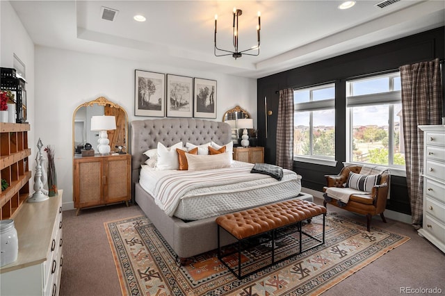 2855 Pawnee Creek Dr, Loveland, CO 80538 - bedroom featuring a tray ceiling, light carpet, recessed lighting, and a chandelier