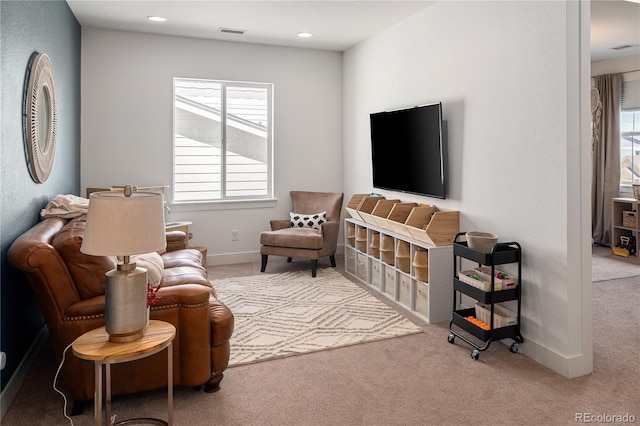 2855 Pawnee Creek Dr, Loveland, CO 80538 - living room featuring carpet and recessed lighting