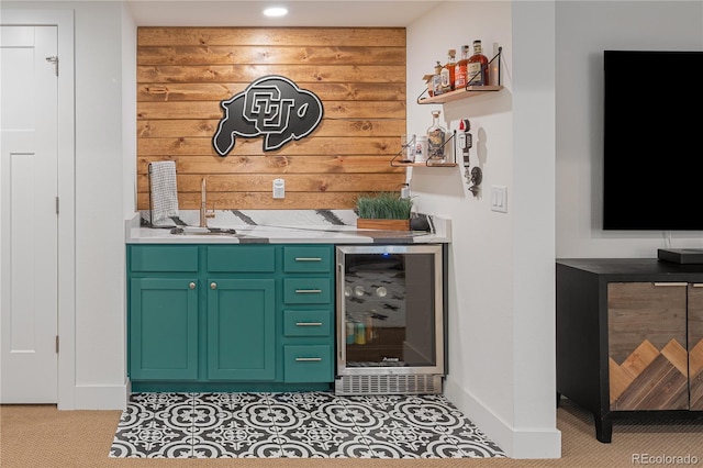 2855 Pawnee Creek Dr, Loveland, CO 80538 - indoor wet bar with beverage cooler and wood walls