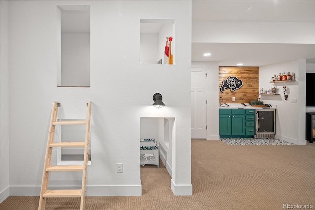 2855 Pawnee Creek Dr, Loveland, CO 80538 - stairs with wet bar, carpet, beverage cooler, and recessed lighting