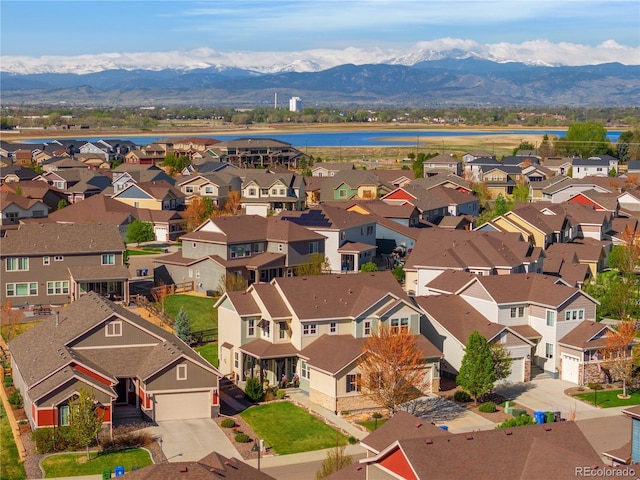 2855 Pawnee Creek Dr, Loveland, CO 80538 - aerial perspective of suburban area with a water and mountain view