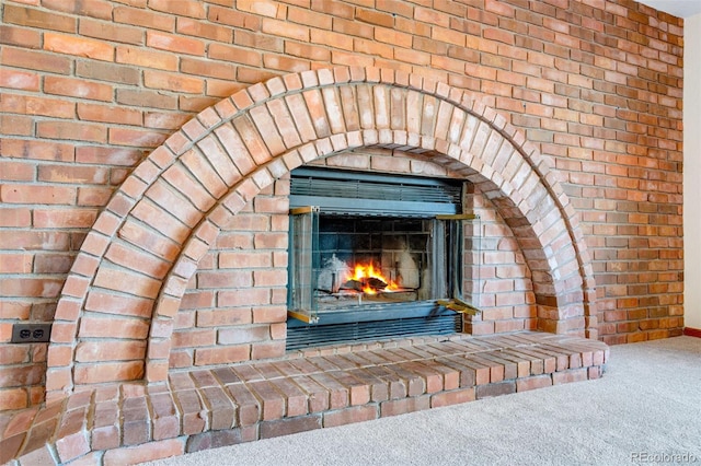 2631 Yorkshire St, Fort Collins, CO 80526 - detailed view of carpet flooring, a fireplace, and brick wall