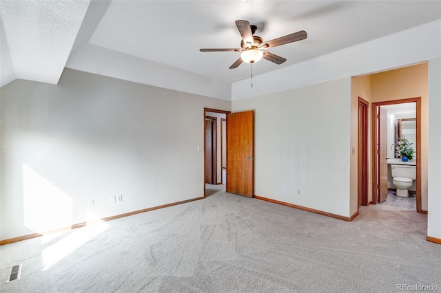 2631 Yorkshire St, Fort Collins, CO 80526 - unfurnished bedroom featuring light carpet, ensuite bath, and a ceiling fan