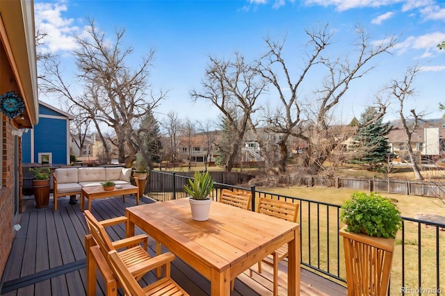 2631 Yorkshire St, Fort Collins, CO 80526 - wooden deck with a fenced backyard, an outdoor living space, and a water view