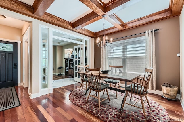 14179 Madison St, Thornton, CO 80602 - dining space featuring hardwood / wood-style flooring, healthy amount of natural light, a chandelier, beamed ceiling, and coffered ceiling