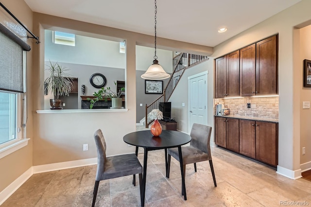 14179 Madison St, Thornton, CO 80602 - dining space with stairs and recessed lighting