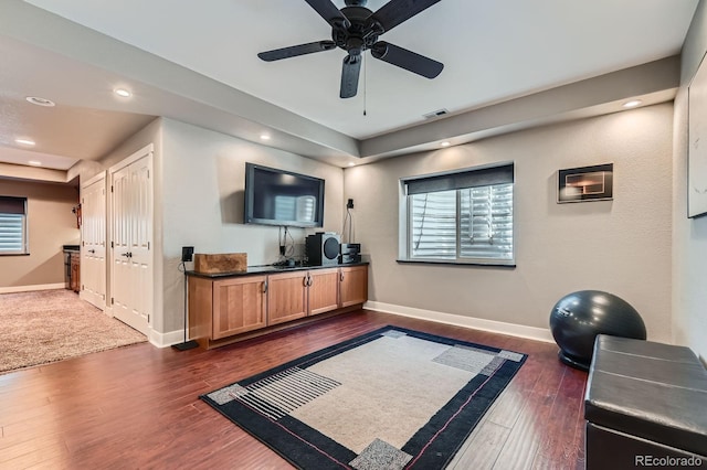 14179 Madison St, Thornton, CO 80602 - workout room featuring a ceiling fan, dark wood-type flooring, healthy amount of natural light, and recessed lighting