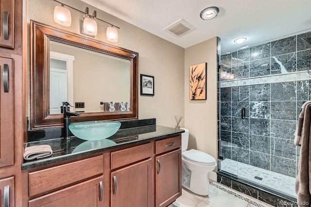 14179 Madison St, Thornton, CO 80602 - full bathroom featuring vanity, a stall shower, and tile patterned flooring