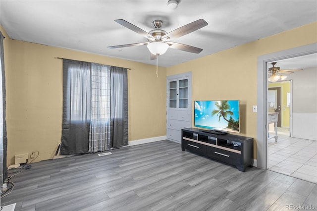 48 Elm St, Arriba, CO 80804 - living room with hardwood / wood-style flooring and ceiling fan