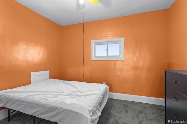 48 Elm St, Arriba, CO 80804 - bedroom featuring ceiling fan and dark colored carpet