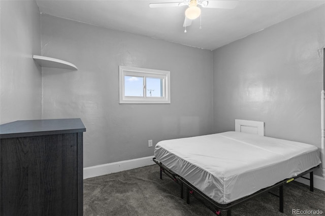 48 Elm St, Arriba, CO 80804 - bedroom with dark carpet and ceiling fan