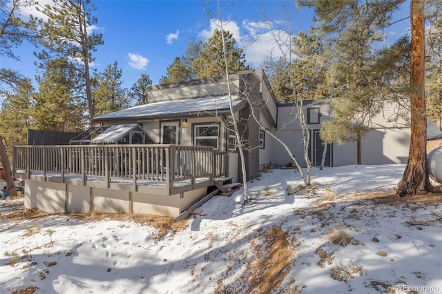 view of front of house with a wooden deck