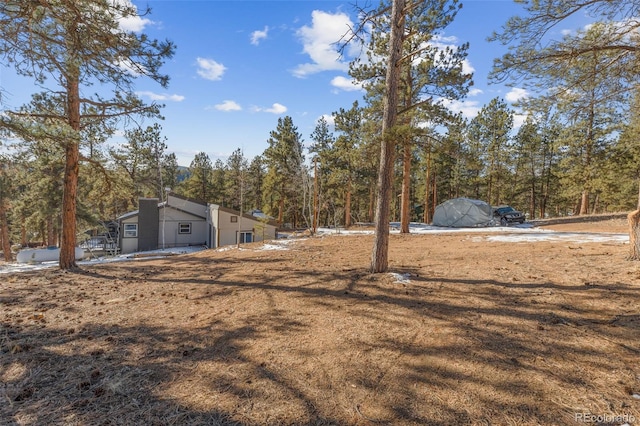 177 Gray St, Bailey, CO 80421 - view of yard with a wooded view