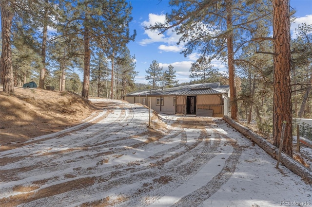 177 Gray St, Bailey, CO 80421 - view of front of property with driveway and a garage