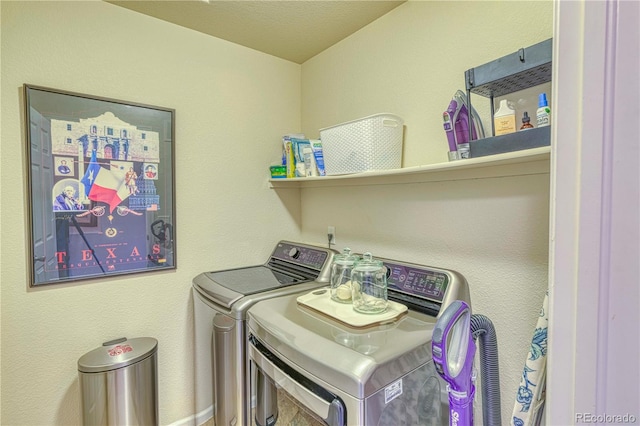 laundry room with laundry area and washer and clothes dryer