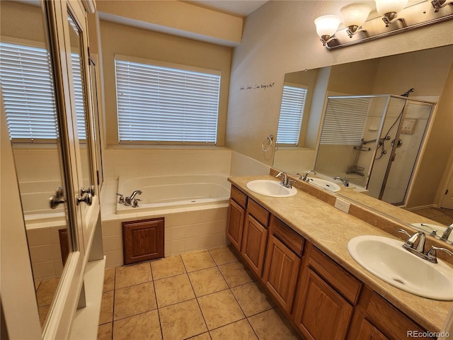 221 Homestead Pkwy, Longmont, CO 80504 - full bath with a bath, a stall shower, double vanity, and tile patterned floors