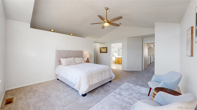 carpeted bedroom featuring ensuite bathroom, ceiling fan, and lofted ceiling