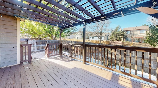 wooden terrace featuring a pergola