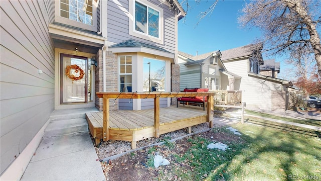 doorway to property with a wooden deck