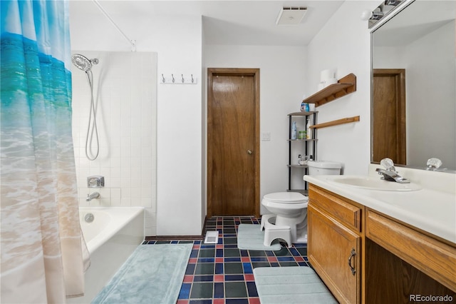 full bathroom with shower / bath combo with shower curtain, vanity, and toilet