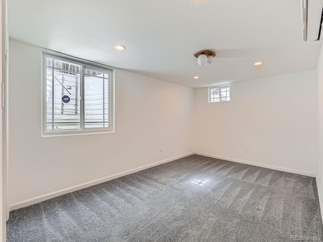 below grade area featuring recessed lighting, carpet flooring, and baseboards