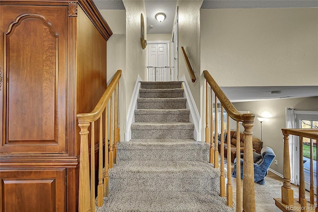 12028 W Aqueduct Dr, Littleton, CO 80127 - stairway with baseboards