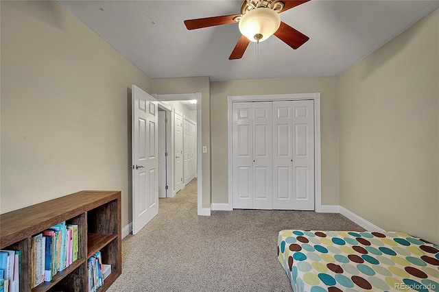 12028 W Aqueduct Dr, Littleton, CO 80127 - bedroom featuring a closet, ceiling fan, baseboards, and carpet