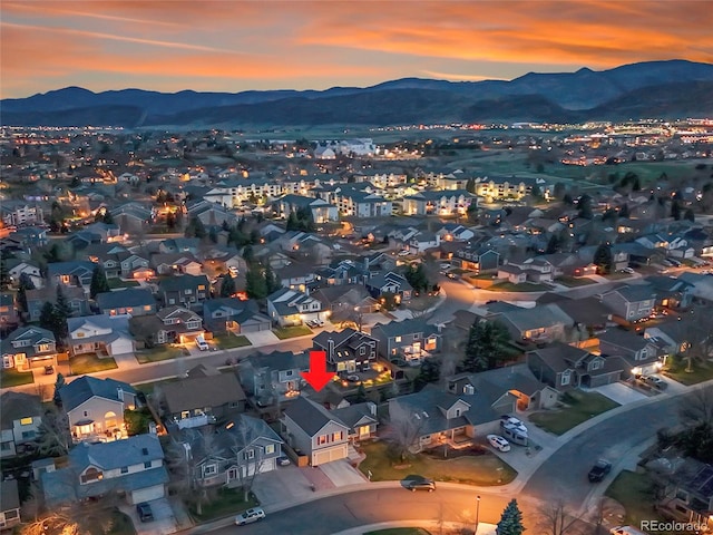 12028 W Aqueduct Dr, Littleton, CO 80127 - bird's eye view with a residential view and a mountain view
