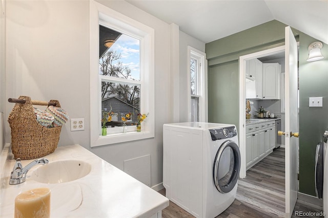225 N Cedar St, Colorado Springs, CO 80903 - laundry room featuring washer / clothes dryer, laundry area, wood finished floors, and a sink
